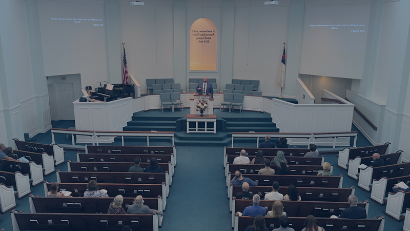 Pastor Lang preaching